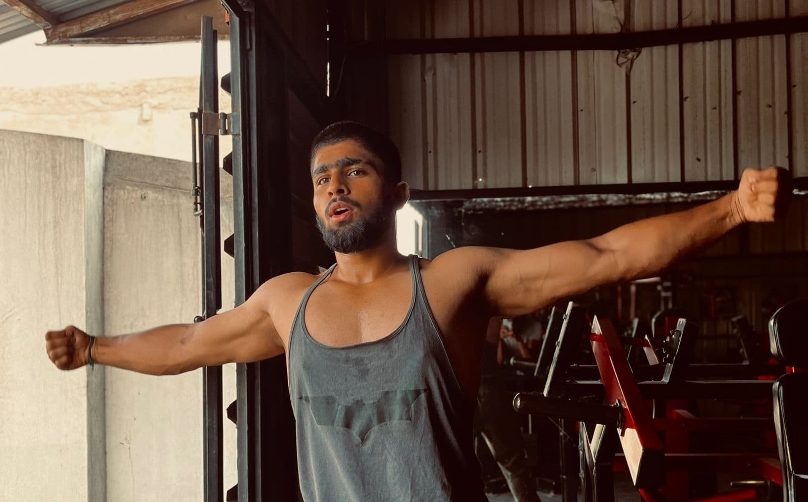 Coach Rohith arms wide