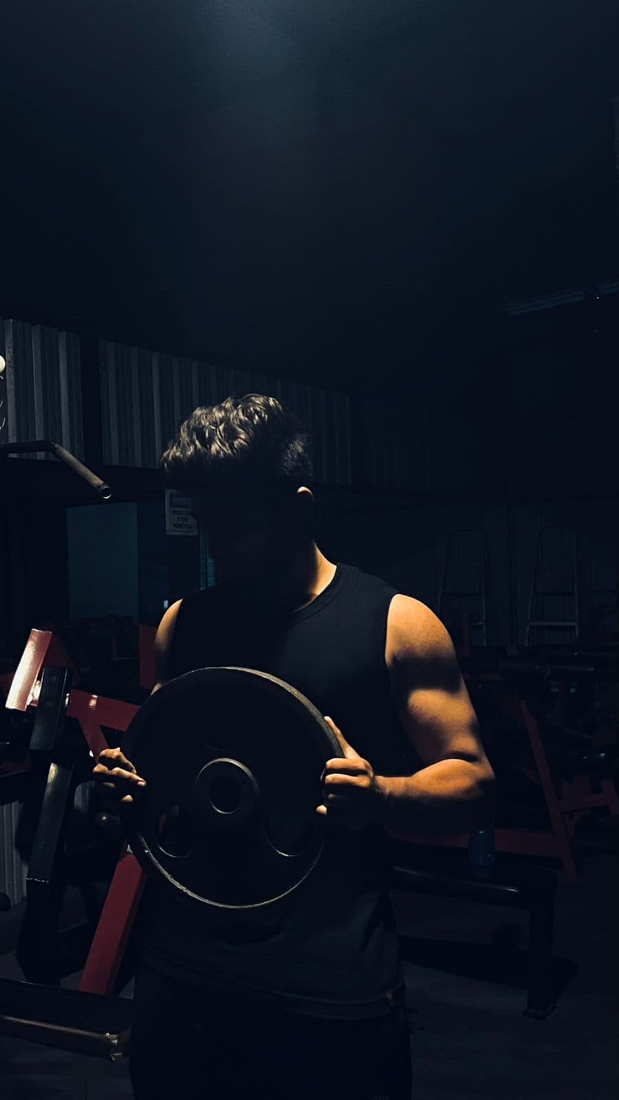 Coach Rohith with weight plate